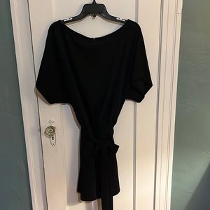 Amazon shorts romper never worn.  Polyester/Rayon material. Size L